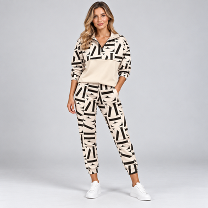 Women's half-zip tracksuit set in beige with black geometric print, front view