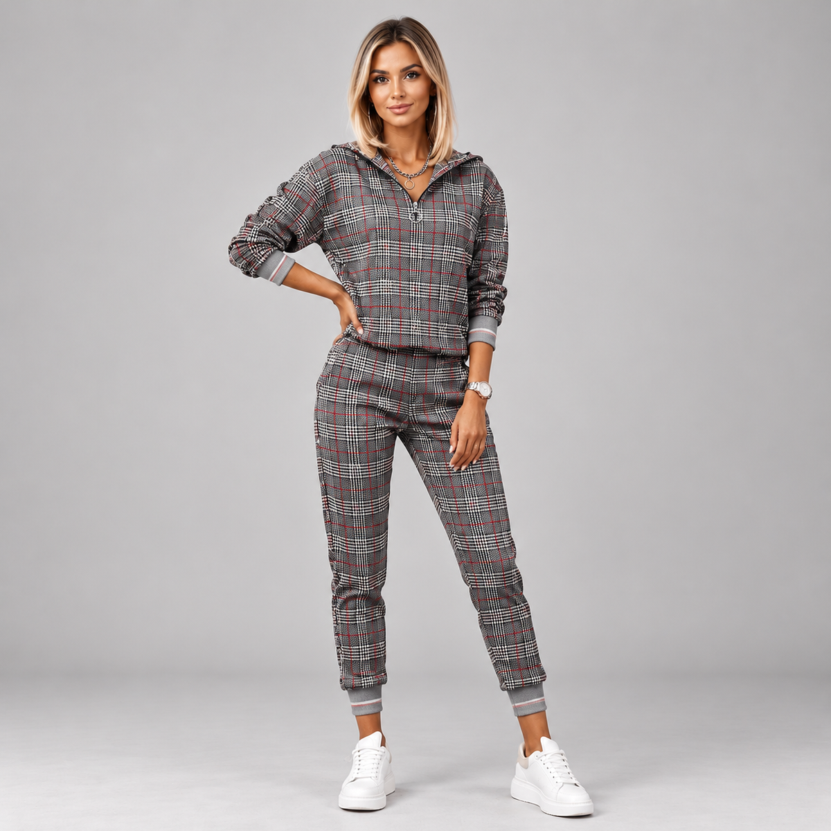 Women's half-zip tracksuit set in dark grey glen check plaid, front view