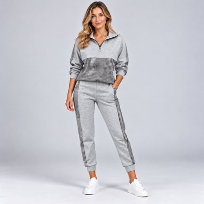 Women's half-zip tracksuit set in grey with houndstooth panels and jogger pants, front view